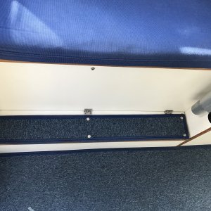 Media 'Foot rest in front of port bench seat with storage compartment underneath.' in album 'Always covered when not in use.'