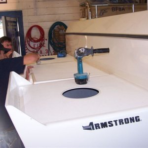 (Cygnet)Perfect fit.  Sit on transom, swing legs over.  Room for generator, too.