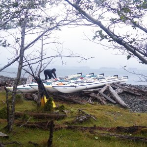 Making sure that the boats are well above the tide and secured to the trees.