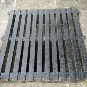 Typical metal sluice vent grate.  In the 1800's a rotund canal Supervisor fell through the wooden grate 13 ft into the rock sluiceway to be spit out into the lock pit amazingly mostly alive.  He mandated steel grates which are still there today, 180 years later.
