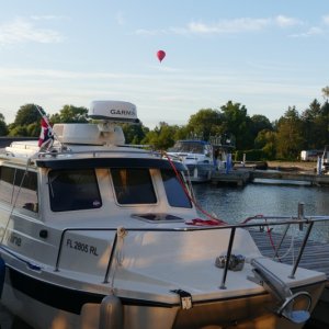 Hot air balloon launch over Dow's Lake, Ottawa, Ontario, Canada.  Quebec is across the river.
