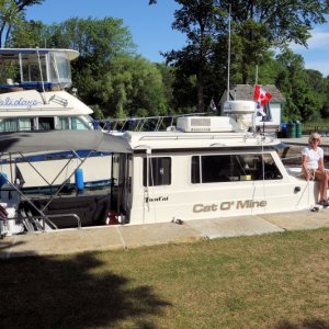 Typical Canada lock wall in July-Aug.  Locals on Hoidaze just met us in the lock but invited us to stay at their private dock with power and water!   
Friendly Canada neighbors as always!
Fly your courtesy Canada flag above your US flag per custom.