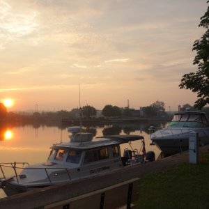 Baldwinsville town dock at sunrise, very quiet next to a cemetary