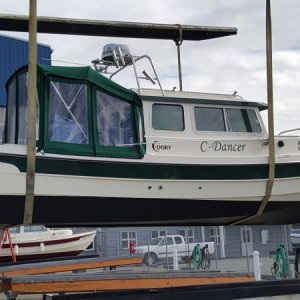 With shiny new bottom paint and brand new motor.  That's Salish-C in the background.