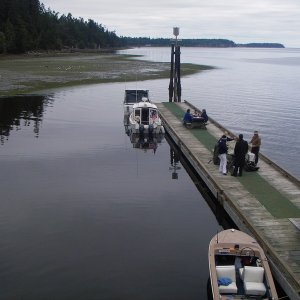 Even at low tide there is room to maneuver, just stay within 30-40ft of the dock to avoid the stakes. (Markers for a shellfish bed).
