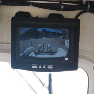 Media 'AFTER  getting the original monitor wet from spray thru the center windshield,(I left the protective plactic cover off)it was time to move it to a drier location to the right of the C80's Alphanumeric Keypad -above the windshield.
The replacement came from 'RVCams.com'.' in album 'Backup system LCD color monitor beside GARMIN 2006C. Audio from camera mic is fed to monitor.'