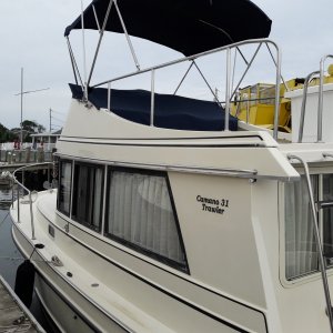 Bimini and flying bridge canvas are on.