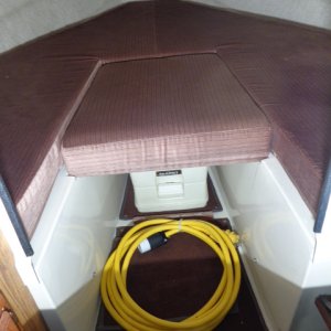 Media 'Upholstered V-Berth,
Porta Potty and
Shore Power Cord' in album 'Wash down new trailer and make some roller adjustments before getting on the road.  FOR SALE 2023'