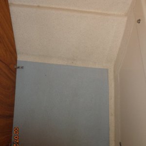 Storage area under front port seat.