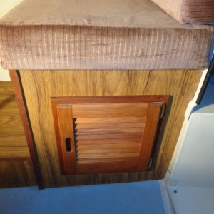 Finished installation of louvered door under front port side seat.