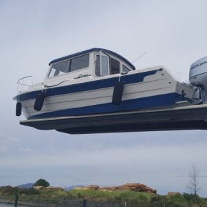What a beautiful boat.  Brock says the color is \"Oxford Blue\"