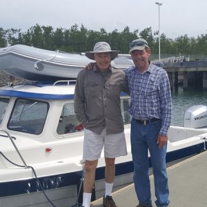 Media 'Brock with his buddy Mark.  Check out that beautiful brand spanking new boat and motor, Honda 150!' in album 'Brand new forklift driver picking up the brand new boat from the work stand.  The experienced driver there for support.'