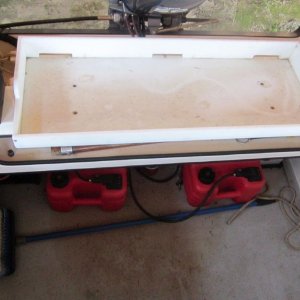 So, in addition to eliminating the deck penetrations, I'm hoping to clean up this mess.  You can just barely see the fuel filter screwed to the deck between the gas cans, which are screwed to the deck inside of the battery trays, which are also screwed to the deck.  All screws go into the balsa core.
