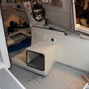 Seat box removal, showing the exploratory drilling on the port side that made me decide to remove everything.  The dark holes indicate bad balsa core.  The outer holes are marked "OK" with a red marker, although I may find that's a bit hopeful when I go further.
