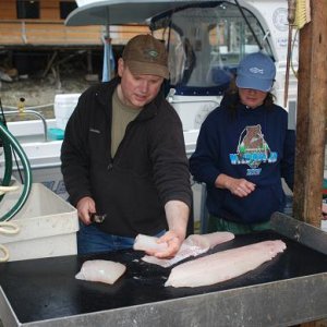 Cleaning Halibut with the gracious help of Eagle Charters