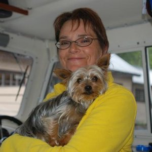 8-18-08     Debbie Holt Sullivan Bay manager with Buddie the Yorkie
