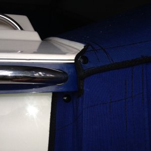 Overhang detail.  No Velcro and zip as we are anchored more than docked.