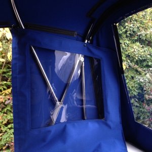 Instead of roll up, we wanted pull aside panels to snap up, keeps entry clear of obstruction