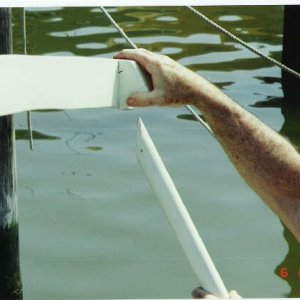 Back support is held in place with poles that go into the rod holders.