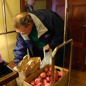 Media 'Warren looks over those
beautiful red potatoes that
Roger brought to share with
us. Thanks, Roger!' in album 'Greeting old friends!'