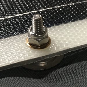 07 a lock nut to finish (I have access to coroplast scraps from work so added a piece between the binimi fabric and solar panel for added ventilation) I think it would take about 5 minutes to take it all off and the studs would stay in place