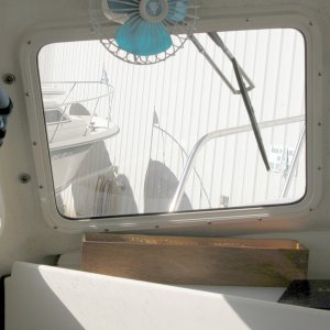 Media 'PIX shows the port side original 11.5" SS Deluxe wiper with the replacement arm. The new 14" wiper is now installed. It's adjusted parallel to the outside edge of the window and centered in its height.' in album 'Standard 11.5" wipers and arms replaced with Pantographic arms and 14" SS Deluxe wipers. Adjustment of the 14" wiper position is straight forward with plenty of room for a full sweep. Adjust it parallel to the side in the park position. Either the SS Deluxe or SS Standard wiper(cheaper) could be used.'