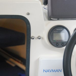 Sea Angel's Port & Starboard momentary wiper control switches - beside the digital port engine instrument guage & above the NAVMAN cover. These preclude having to push on-off the main wiper switches. Labels to follow.