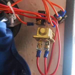 Media 'Helm Wiper Motor/Washer Switches.

 The added Washer Switch is the larger bottom switch. An in-line fuse holder is located abt 2" from HOUSE 12V BUSS feeding the Washer Switch.' in album 'Standard 11.5" wipers and arms replaced with Pantographic arms and 14" SS Deluxe wipers. Adjustment of the 14" wiper position is straight forward with plenty of room for a full sweep. Adjust it parallel to the side in the park position. Either the SS Deluxe or SS Standard wiper(cheaper) could be used.'