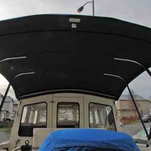 Media 'Canvas frame, stern view.' in album 'Sunbrella canvas, port side.  I wanted it to cover the spash well so I could bar-b-que in the rain.  Good thing too as it rained every weekend I was out last summer.'