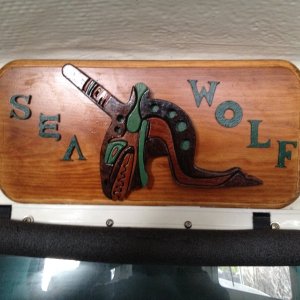 Sea Wolf sign mounted over door
