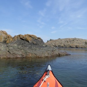 Exploring the various rock formations on the outside of Watmough bay