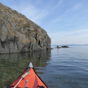 Exploring the various rock formations on the outside of Watmough bay