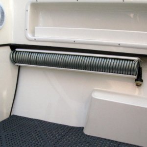 washdown pump hose & cockpit speakers - pump is above port gas tank