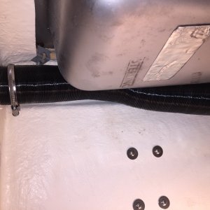 Hot air vent view from underneath sink