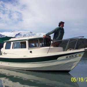 (C-Biscuit) JR can actually sleep fully stretched out in the cuddy!  What a boat!