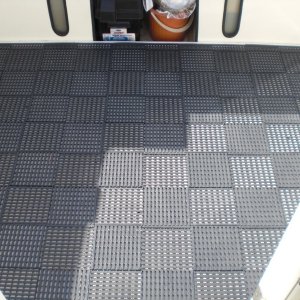 Rubber multi-deck floor in cockpit.