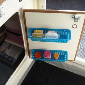Plastic bins from Dollar Store. Under galley storage. Copied from Kerri On.