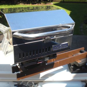 Media 'BBQ mounted inboard.  Underneath the BBQ there is a Scotty male part that slots into the Scotty female part.' in album 'Glued on rubber multi-deck under the anchor stock to protect the gel coat.'