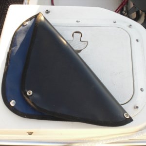 Used a vinyl/rubber type backing to improve the water repellant qualities.