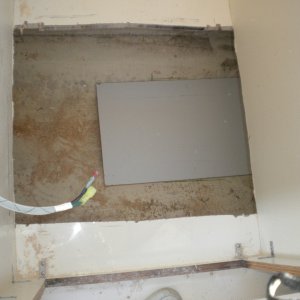 Shelf secured to hull.