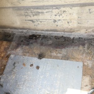 Rot surrounding old rivet holes