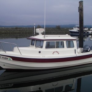Jim's Dorie, first launch (and first at John Wayne Marina).  Still hadn't settled on our boat name - SleepyC.