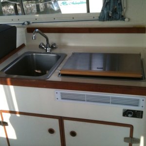 Media 'The galley area, showing sink and Wallas heater/stove' in album 'Looking forward from behind the driving seat'