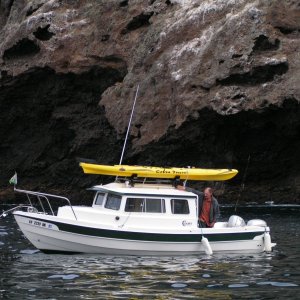 Jeff and boat anchored close to the Painted Cave