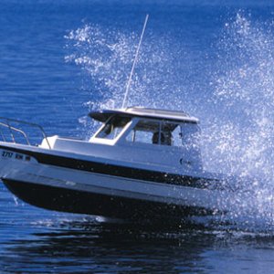 First Boat, 2001 CD-16. - Used in C-Dory Brochure Photo.  The factory borrowed our boat for their photo shoot. Three subsequent factory owners used the pictures as well.