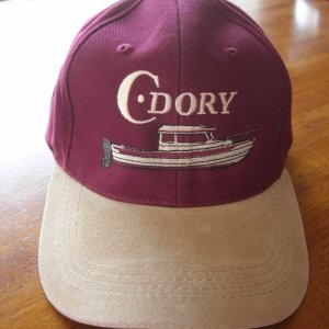 Made by Bergen & Co Embroidery Works in Bellingham, WA.  They have this C-Dory logo already set to use on a wide variety of clothing.  Their work is beautiful and they are fun to interact with.