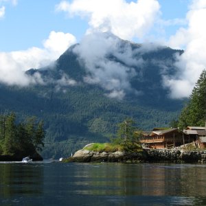 Malibou Lodge at the entrance to Princes Louisa Inlet.  Boat entering the Rapids on an ebbing flow.