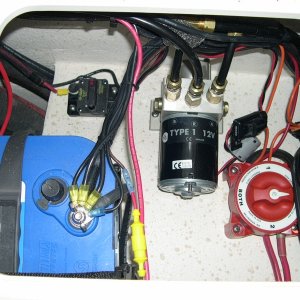 (DaveS) Da New Da Nag's starboard side Lazarette with battery, hydraulic pump and battery selection switch.