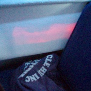 Interior lightshow -- Newport, sunset, putting up the window coverings, we noticed the sunset visible inside the boat beside the dinette!