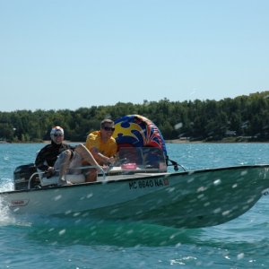 My two boys running my older son's classic 15 ft. Whaler. Boat, motor, and trailer are like new. The old 65 HP Merc. runs strong.